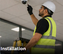 A CCTV Engineer Carrying Out Security Installation Process